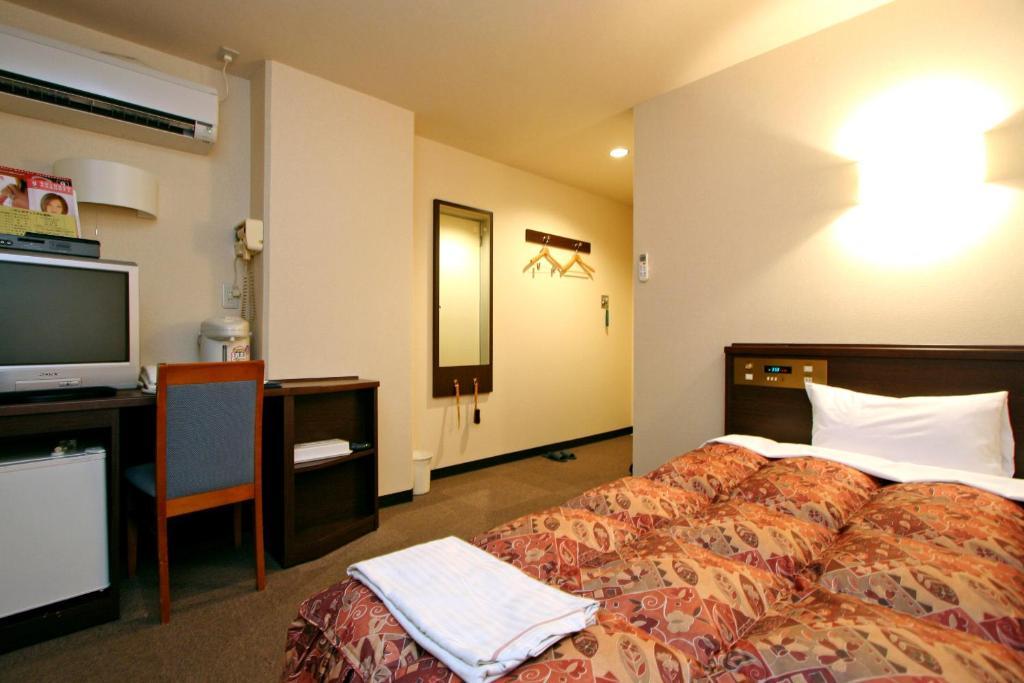 Urban Hotel Kokubu Киришима Стая снимка